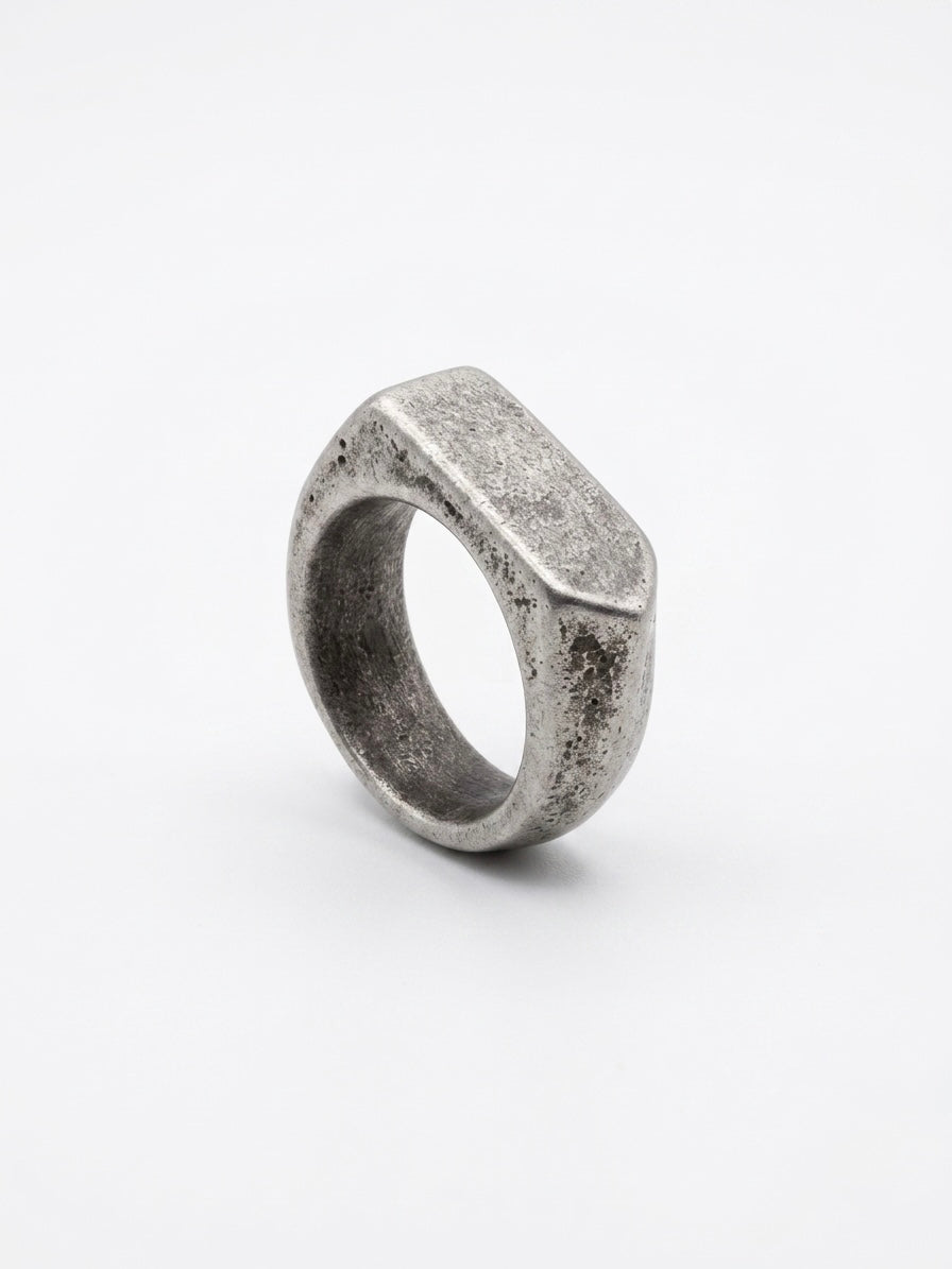 distressed rectangular signet ring. Crafted with a unique weathered surface and bold rectangular face