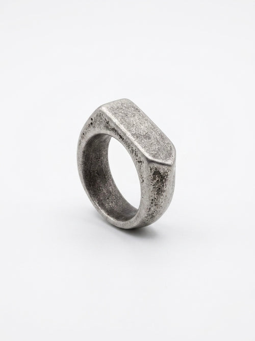 distressed rectangular signet ring. Crafted with a unique weathered surface and bold rectangular face